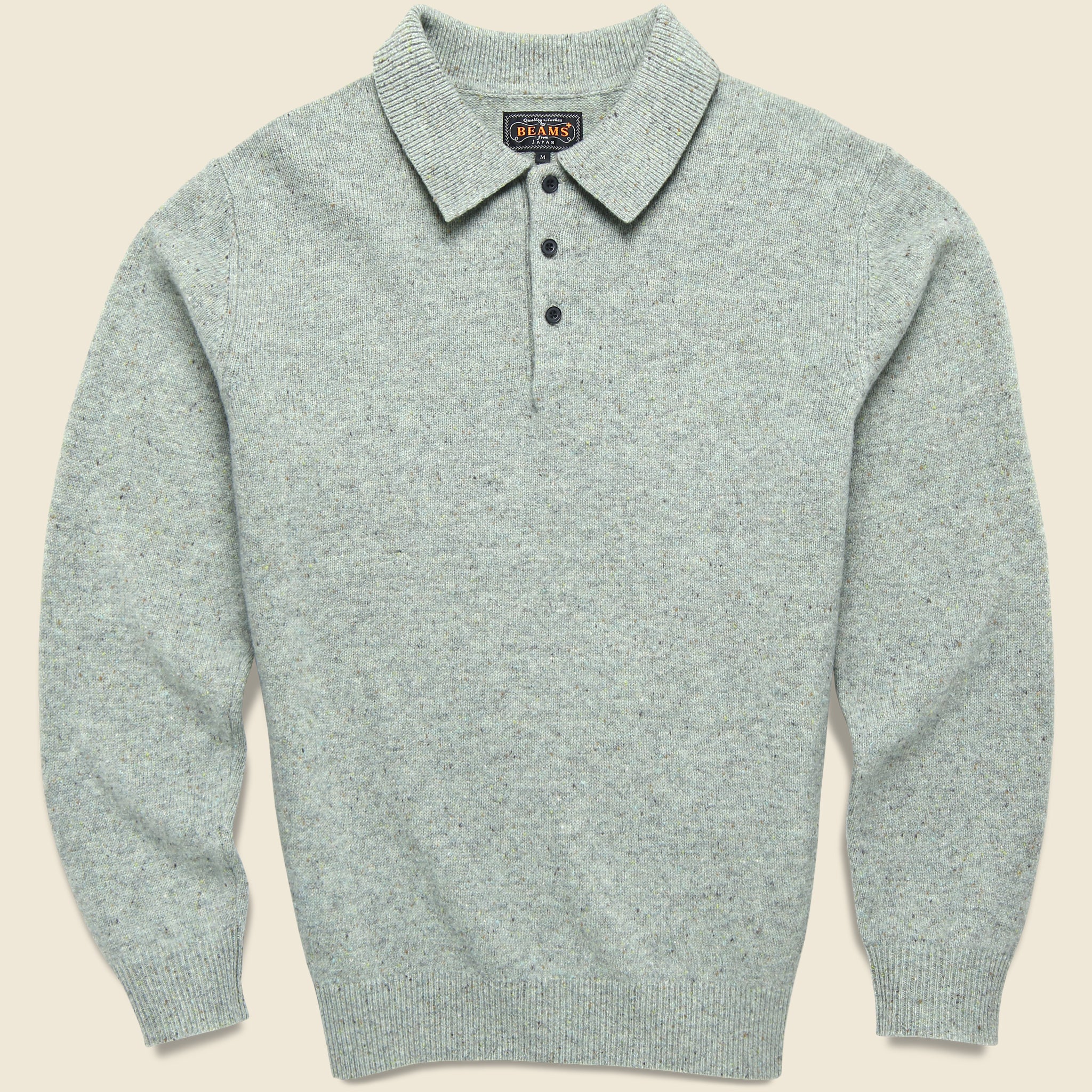 A light gray heather knit polo sweater with a three-button placket and a pointed collar.