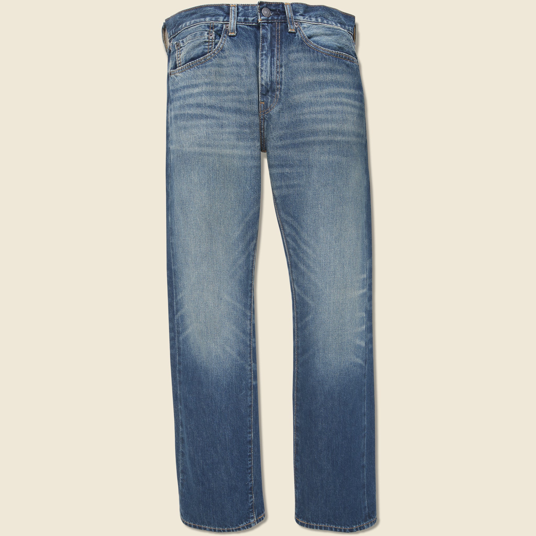 Classic men’s denim jacket from STAG Provisions layered over a white T-shirt for an effortless date night look.