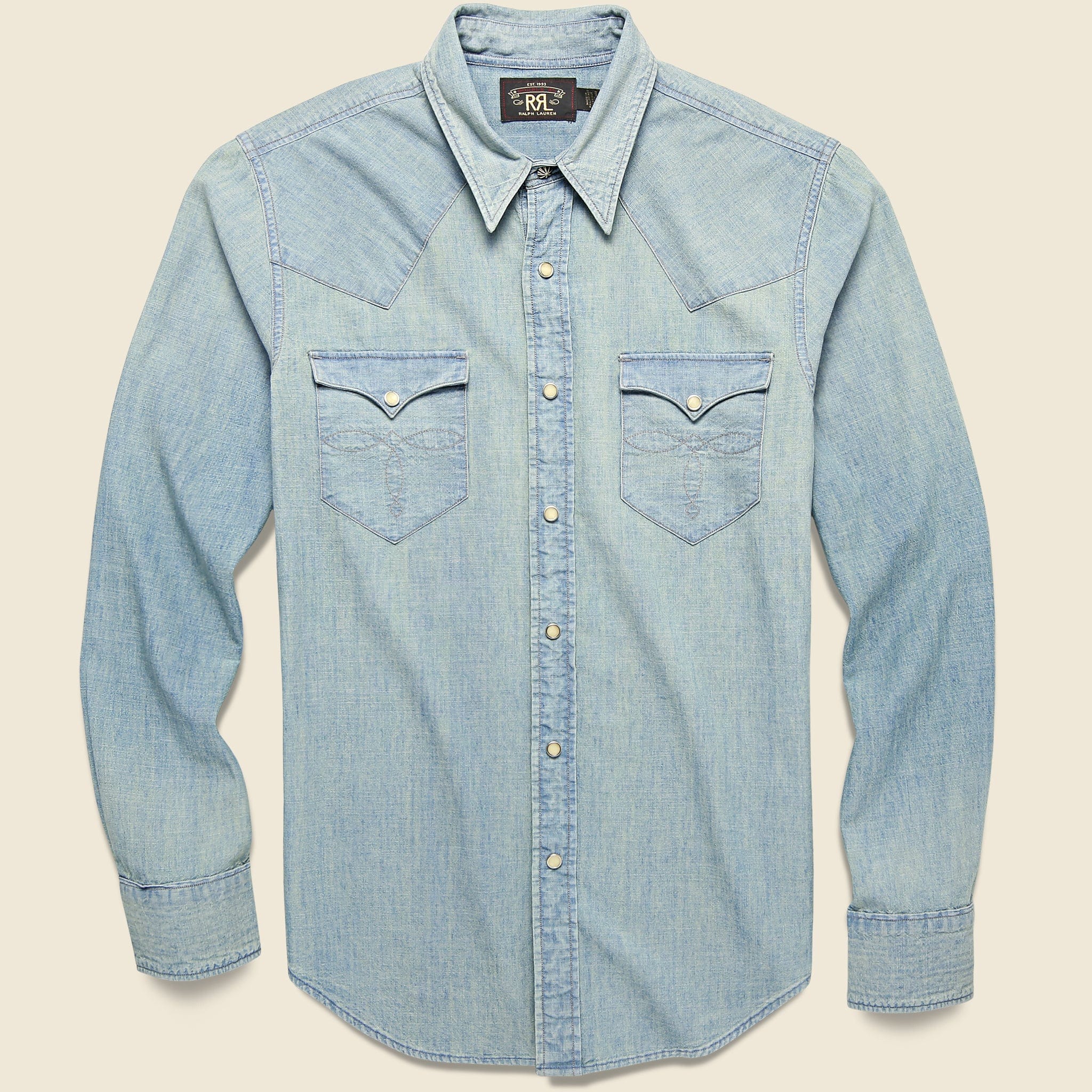 RRL Slim Fit Buffalo Western Shirt in indigo and cream plaid featuring pearl snap buttons, western yokes, flap chest pockets, and a vintage-inspired western design.