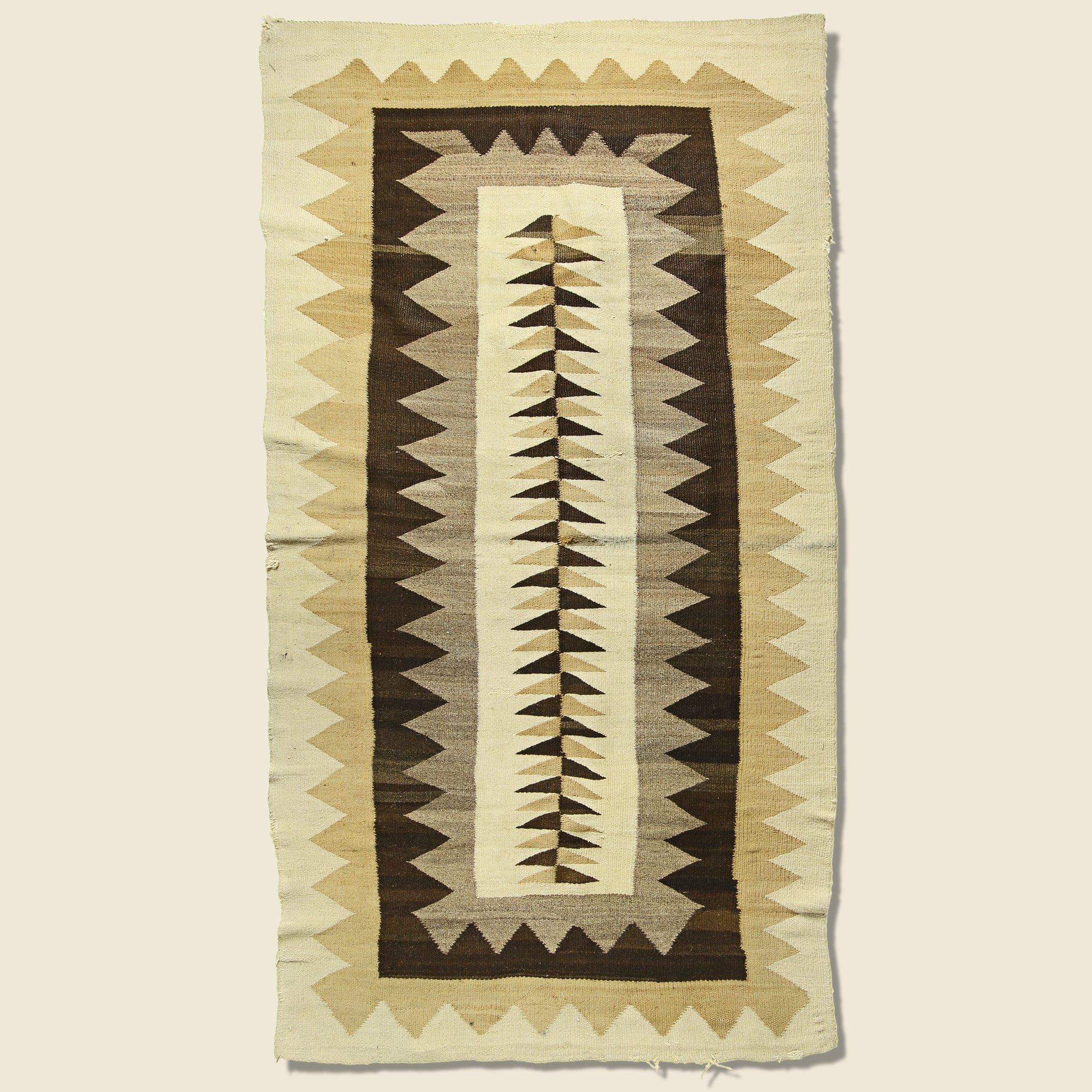 
                          Vintage Zig-Zag Hand-Woven Navajo Wool Rug - Natural Brown
                        