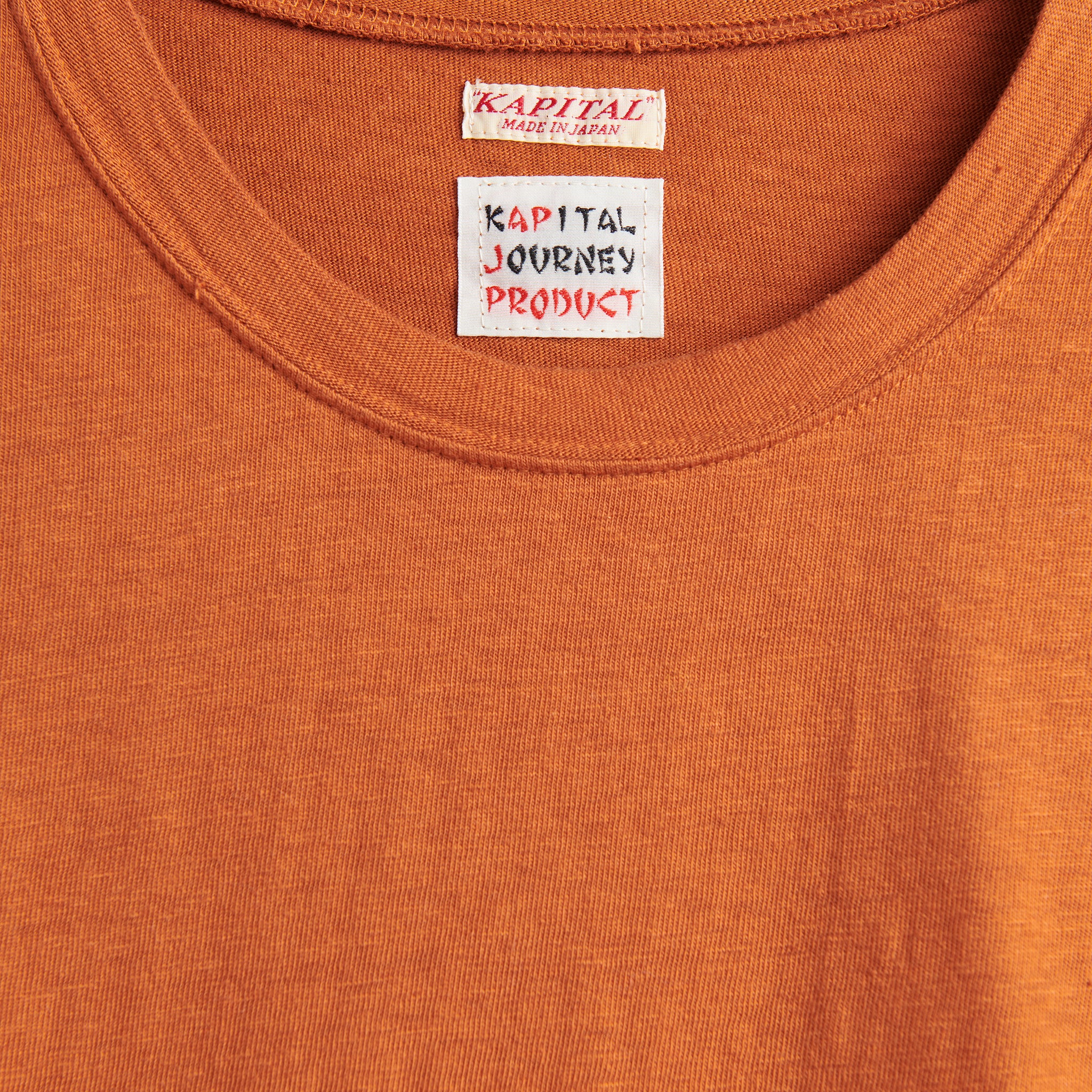 
                          Jersey Hippie Tee (Tibetan Nomad Patch) - Orange - Kapital - STAG Provisions - W - Tops - L/S Tee
                        