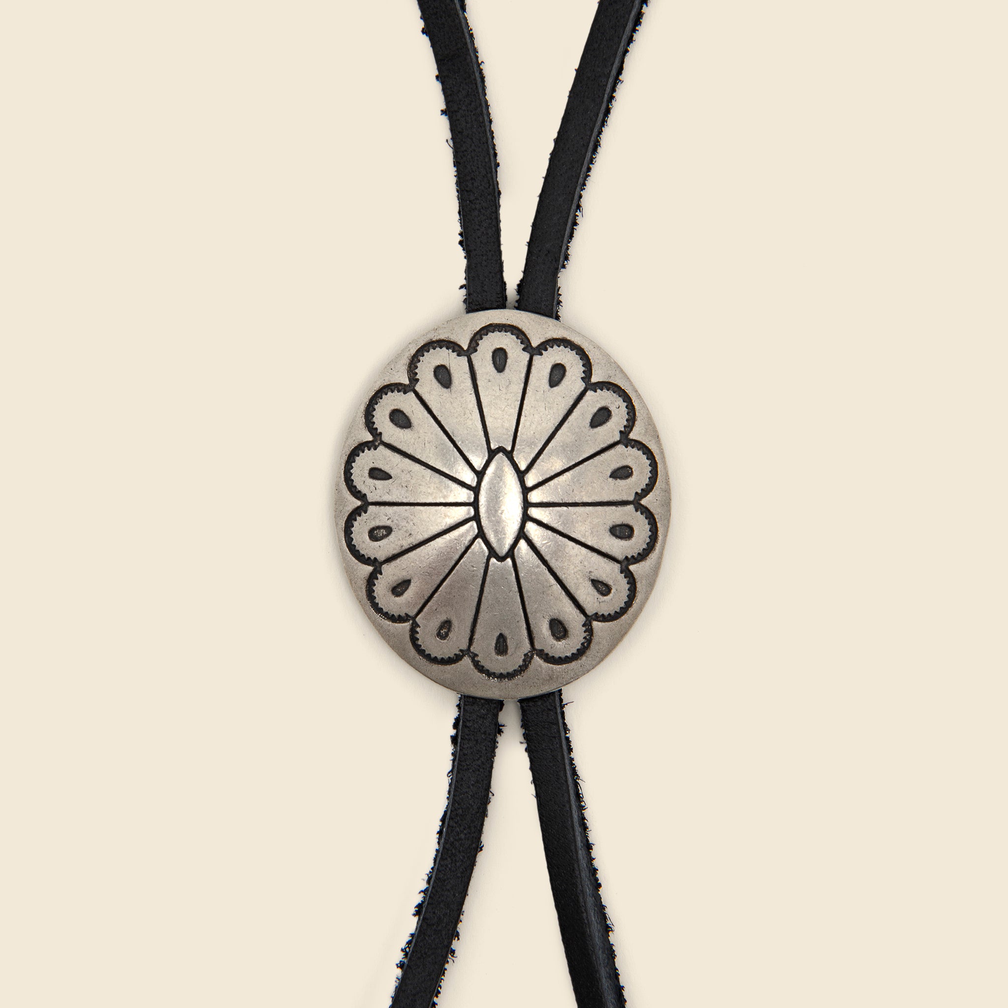 
                          Leather Bolo Tie - Black/Flower Concho - Yuketen - STAG Provisions - W - Accessories - Necklace
                        